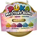 Pūka Mystery Buns collectible squishy surprise toy in gold packaging